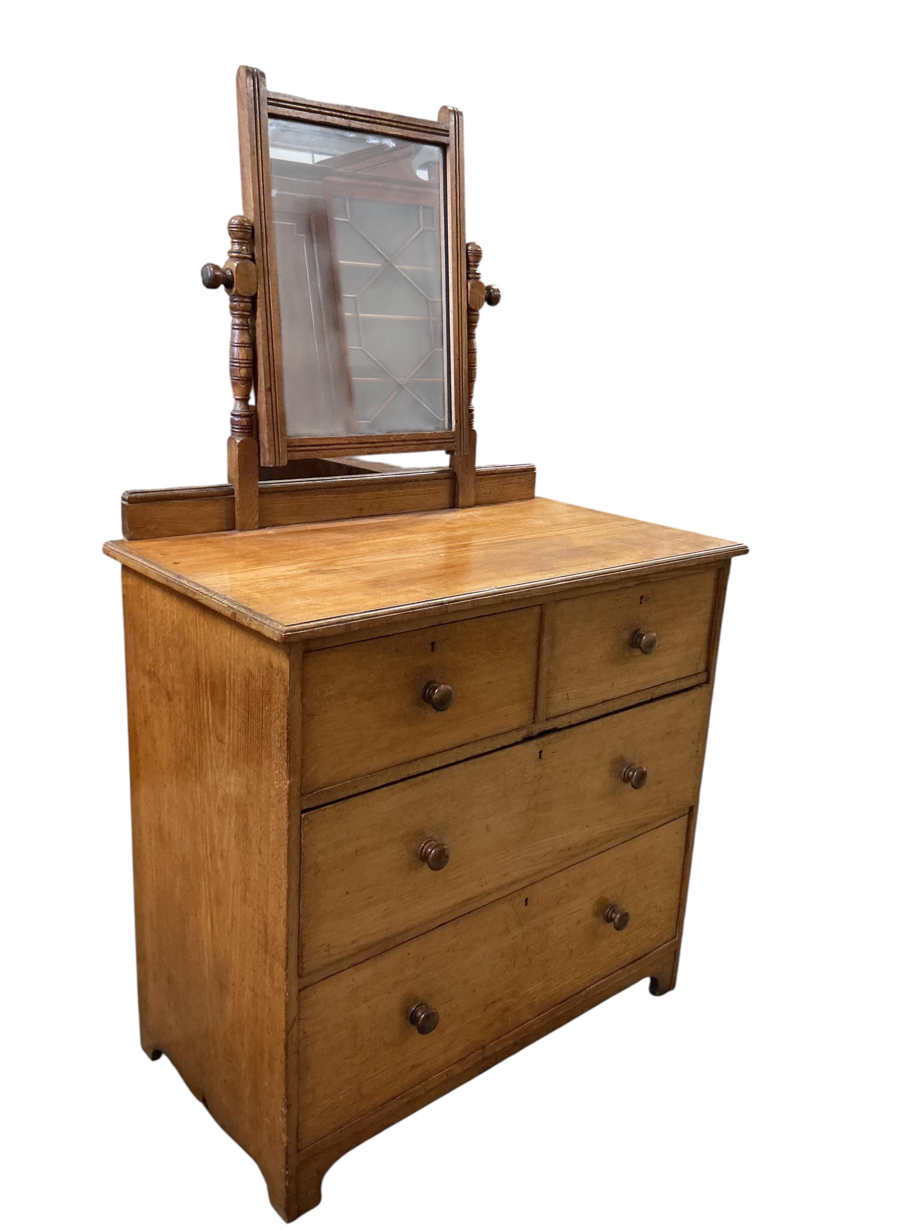 A late Victorian ash dressing chest of drawers by Gillows, width 95cm, depth 52cm, height 162cm